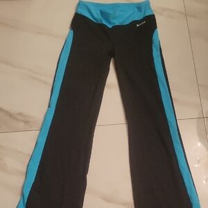 bebe Black Leggings with Bright Blue Side Panels